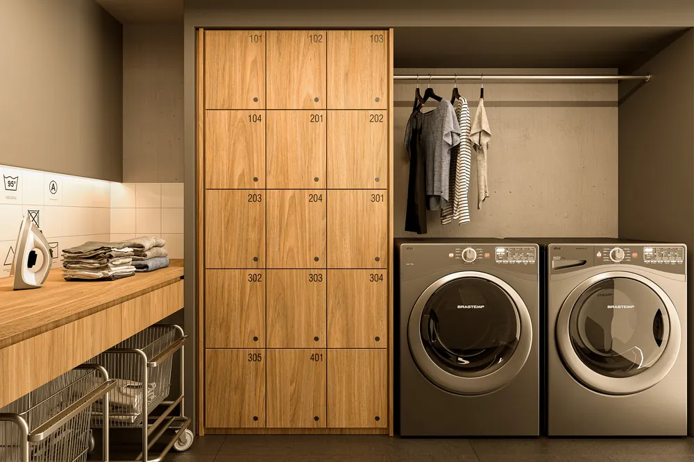 Laundry do Casa Mariana Loft Residencial com lavadoras, secadoras e armários de madeira