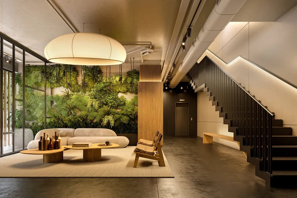 Lobby lounge do Casa Mariana Loft Residencial com sofá, luminária e jardim interno